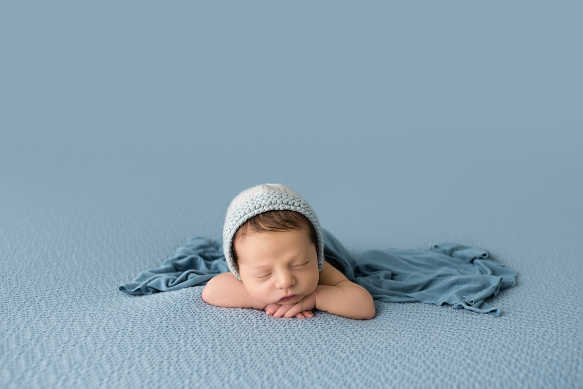 newborn boy on a blue blanket