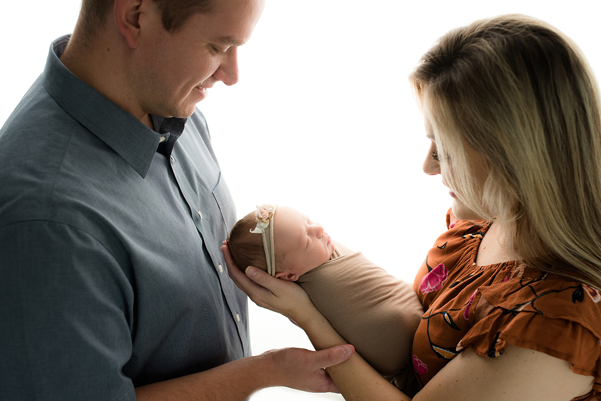 parents with newborn during pittsburgh newborn photo shoot