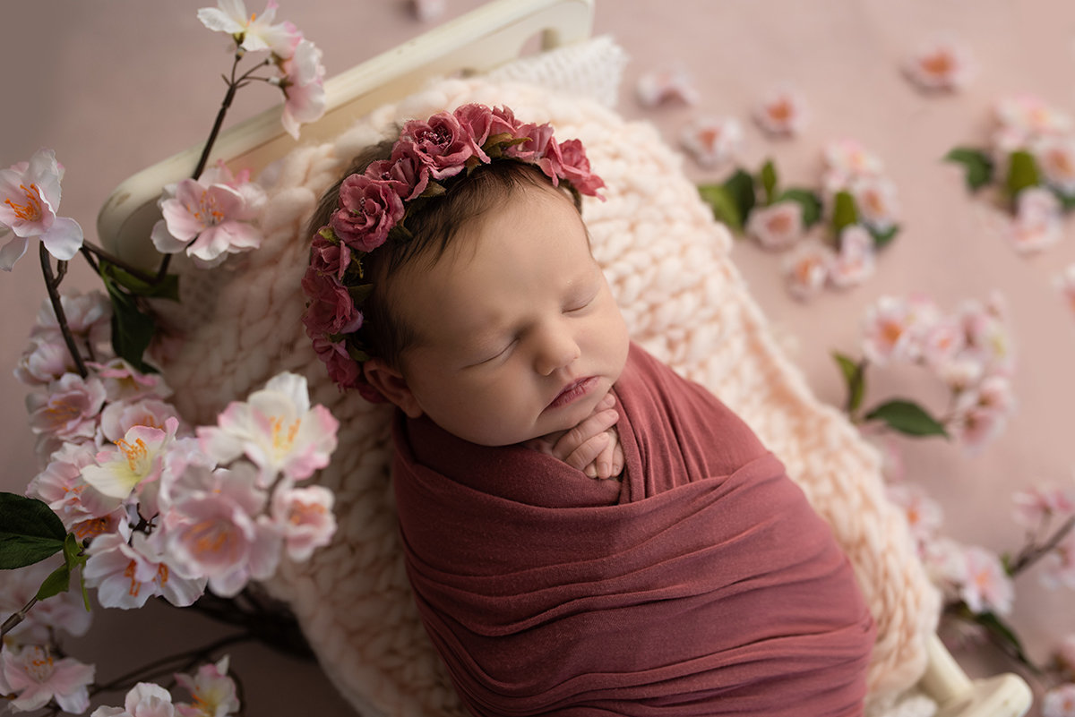 newborn during posed newborn photo session