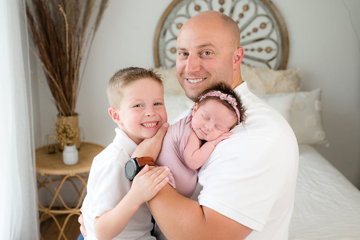 Dad with kids during newborn session